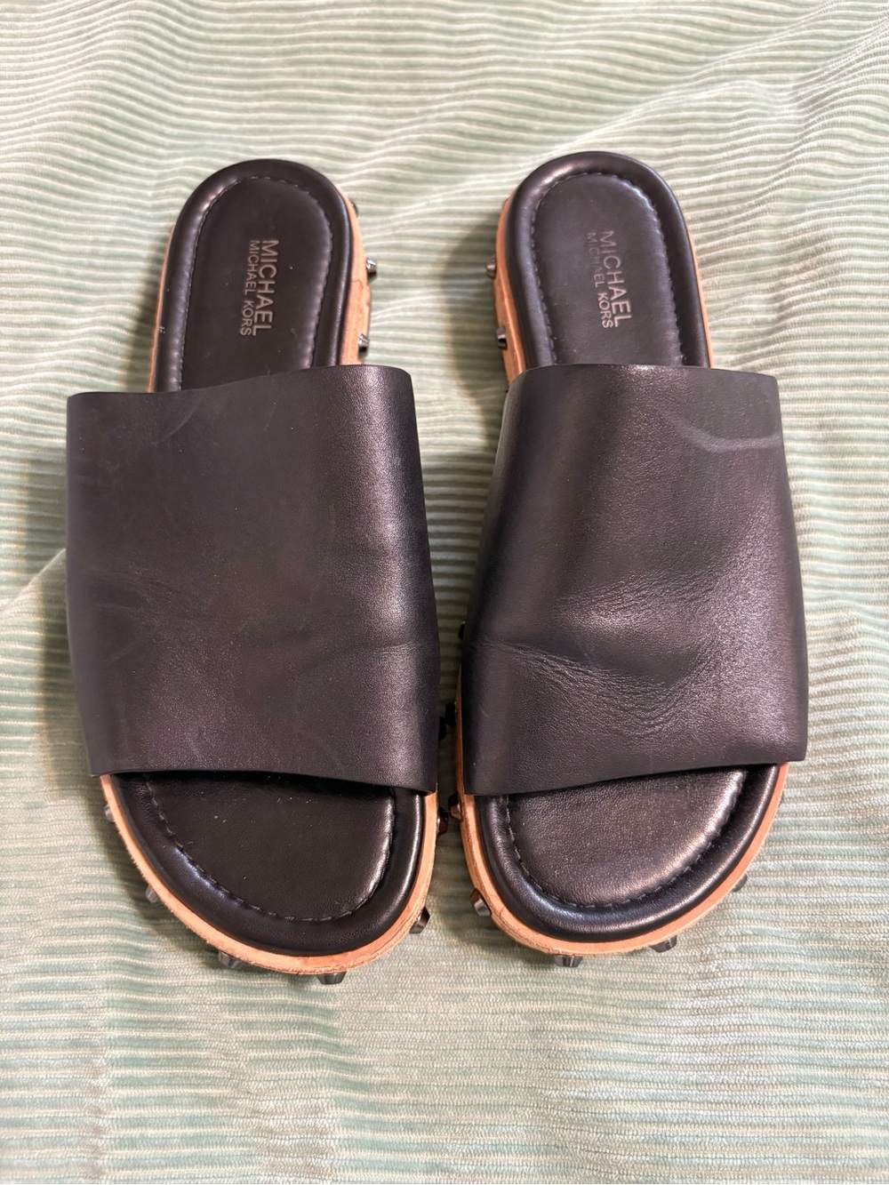 Michael Kors Black Leather Slide Mules with Tan Sole Trim